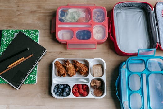 meal prep containers filled with healthy snacks