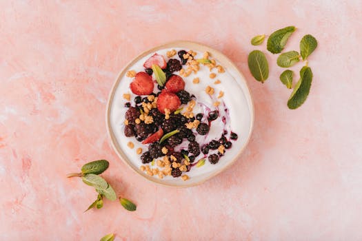 a bowl of fresh berries and nuts